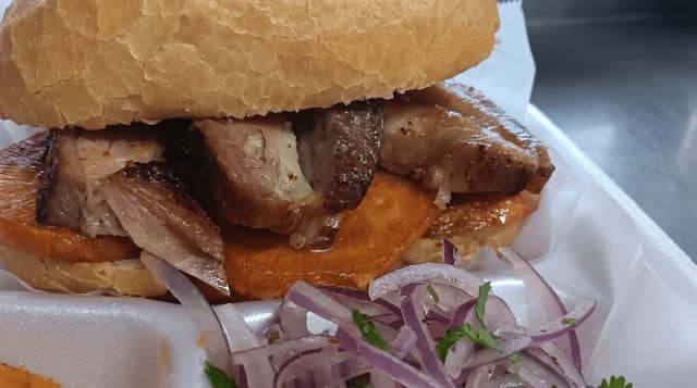 Chicharrón Sandwich with Fried Sweet Potatoes.